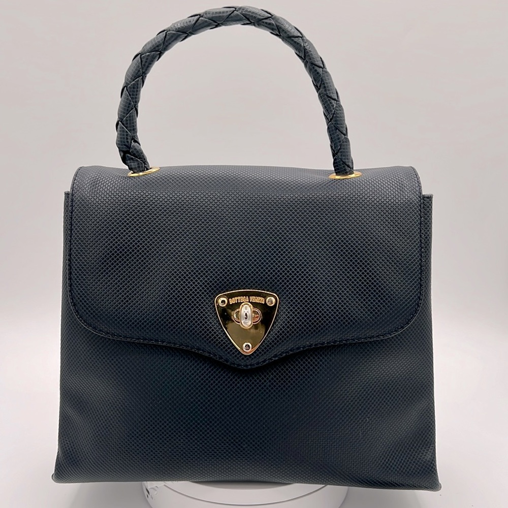 Bottega Veneta leather embossed top handle/crossbody handbag . Made in Italy